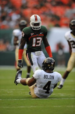 University of Miami Hurricanes defensive back Ryan Hill #13 plays in a game against the Deamon Deacons of Wake Forest at Dolphin Stadium on October...