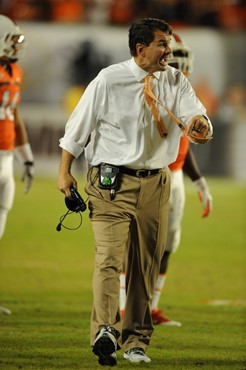 University of Miami Hurricanes head coach Al Golden leads his team on the field in a game against the Boston College Eagles at Sun Life Stadium on...