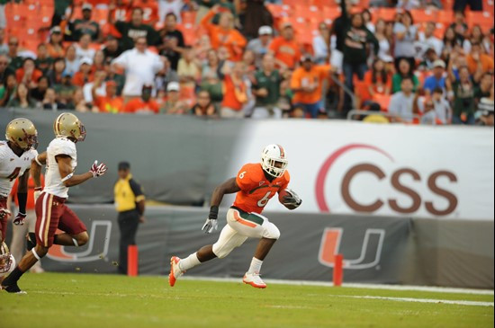 University of Miami Hurricanes running back Lamar Miller #6 carries the ball against the Boston College Eagles at Sun Life Stadium on November 25,...