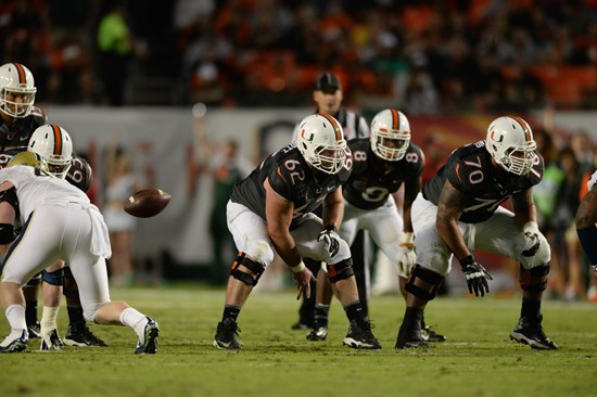 University of Miami Hurricanes offensive lineman Shane McDermott #62 plays in a game against The Pittsburgh Panthers at Sun Life Stadium on November...