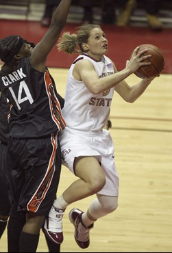 Florida State's Alexa Deluzio, right, drives to the basket as Miami's Charmaine Clark defends during an NCAA college basketball game Thursday, Feb....
