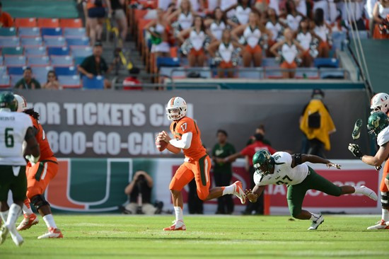 University of Miami Hurricanes quarterback Stephen Morris #17 plays in a game against the University of South Florida Bulls at Sun Life Stadium on...