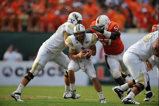 University of Miami Hurricanes defensive lineman Allen Bailey #57 sacks the quarterback in a game against the University of Central Florida Knights at...