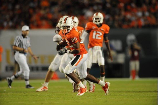 University of Miami Hurricanes wide receiver Leonard Hankerson #85 catches a pass from quarterback Jacory Harris #12 in a game against the Florida...