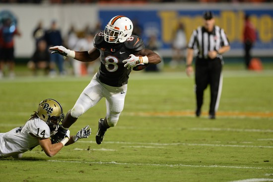 University of Miami Hurricanes running back Duke Johnson #8 plays in a game against The Pittsburgh Panthers at Sun Life Stadium on November 29, 2014. ...