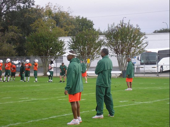 Andreu Swasey (l) and Randy Shannon (r) at practice Friday afternoon at Thunder Field at the Florida Citrus Bowl Sports Complex.