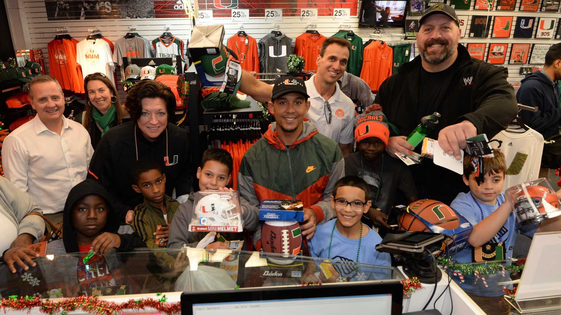 UM Staff Takes Part in allCanes Holiday Event