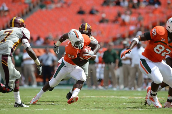 University of Miami Hurricanes running back Eduardo Clements #23 plays in a game against the Bethune Cookman Wildcats at Sun Life Stadium on September...