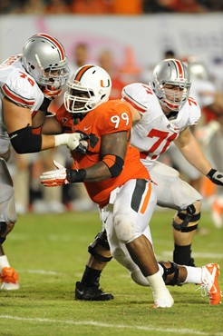 University of Miami Hurricanes defensive lineman Marcus Forston #99 plays in a game against the Ohio State Buckeyes at Sun Life Stadium on September...