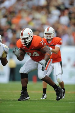University of Miami Hurricanes offensive lineman Orlando Franklin #74 gets set to block against the University of Central Florida Knights at Dolphin...