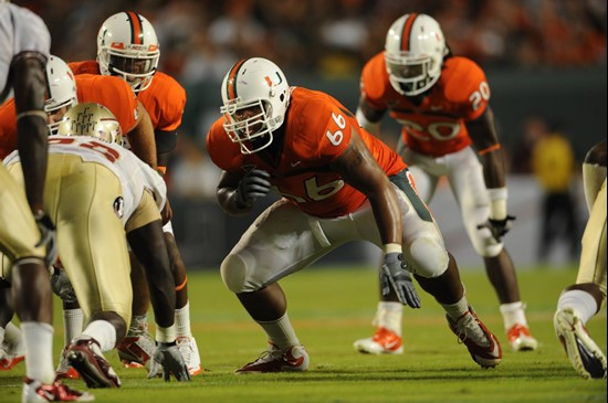 University of Miami Hurricanes offensive lineman Harland Gunn #66 gets set to block in a game against the Florida State Seminoles at Sun Life Stadium...