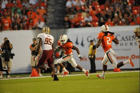 University of Miami Hurricanes wide receiver Travis Benjamin #3 catches a pass in a game against the Boston College Eagles at Sun Life Stadium on...