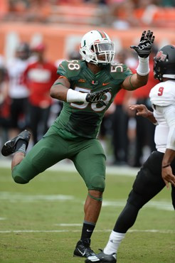 University of Miami Hurricanes linebacker Damion Owens #58 plays in a game against the Arkansas State Red Wolves at Sun Life Stadium on September13,...