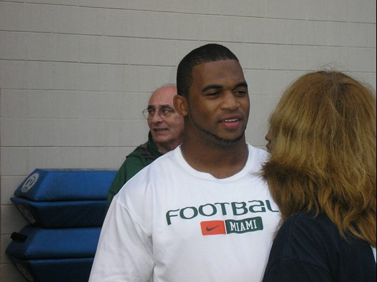 Darryl Sharpton speaks to reporters after Friday's practice at Thunder Field at the Florida Citrus Bowl Sports Complex.