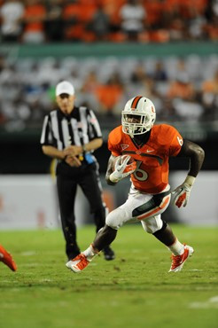 University of Miami Hurricanes running back Lamar Miller #6 carries the ball against the Ohio State Buckeyes at Sun Life Stadium on September 17,...