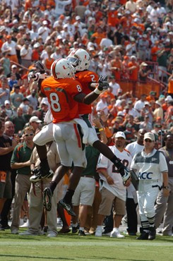 University of Miami wide receiver Darnell Jenkins #8 and running back Graig Cooper #2 celebrate after Jenkins scores a touchdown in a game against the...