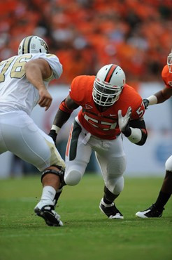 University of Miami Hurricanes defensive lineman Allen Bailey #57 rushes in a game against the University of Central Florida Knights at Dolphin...