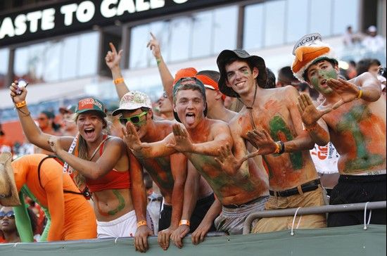 Miami fans cheer before an NCAA college football game against Ohio State, in Miami, Saturday, Sept. 17, 2011. (AP Photo/Lynne Sladky)