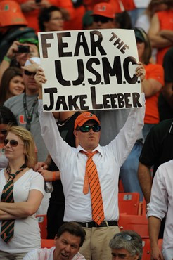 A University of Miami Hurricanes fan shows his team spirit in a game against the Boston College Eagles at Sun Life Stadium on November 25, 2011. ...