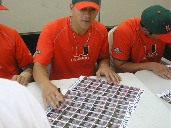Senior pitcher Jason Santana signing for fans