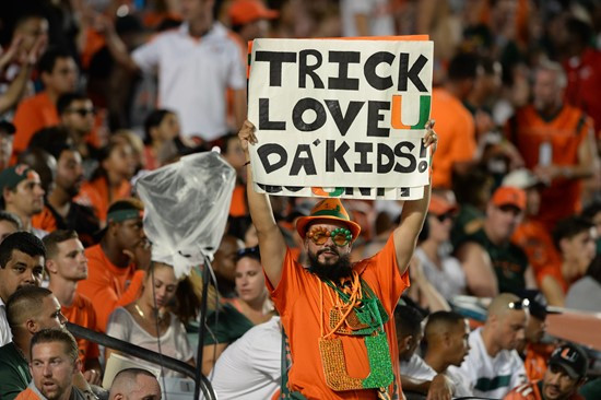 University of Miami Hurricane fans show their team spirit in a game against the Duke Blue Devils at Sun Life Stadium on September 27, 2014. Photo by...