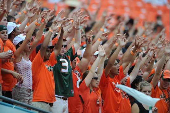 University of Miami Hurricane fans hold up their hands in a game against the Deamon Deacons of Wake Forest at Dolphin Stadium on October 25, 2008. ...