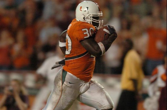 University of Miami Hurricanes running back Tyrone Moss #30 sprints 50 yards to score a fourth quarter touchdown that tied the game 10-10. Moss rushed...