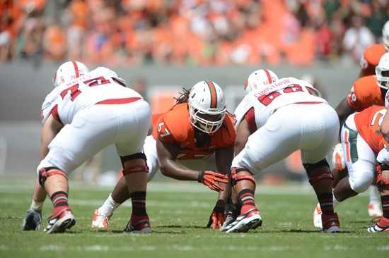 University of Miami Hurricanes defensive lineman Corey King #67 plays in a game against the North Carolina State Wolfpack at Sun Life Stadium on...