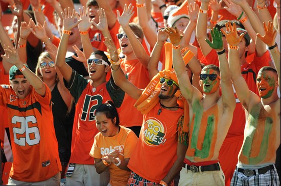 University of Miami Hurricane fans show their team spirit in a game against the Georgia Tech Yellow Jackets at Sun Life Stadium on October 22, 2011. ...