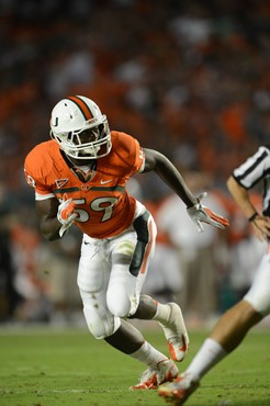 University of Miami Hurricanes linebacker Jimmy Gaines #59 plays in a game against the Florida State Seminoles at Sun Life Stadium on October 20,...