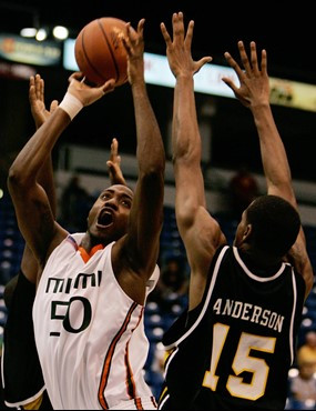 Anthony King goes up for a shot as VCU's Michael Anderson defends. (AP Photo/Andres Leighton)