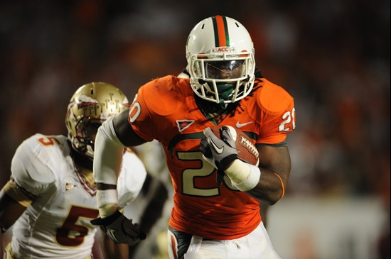 University of Miami Hurricanes running back Damien Berry #20 carries the ball against the Florida State Seminoles at Sun Life Stadium on October 9,...