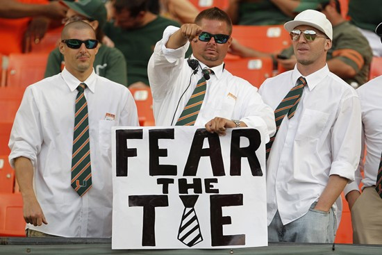 Miami fans hold a sign saying 