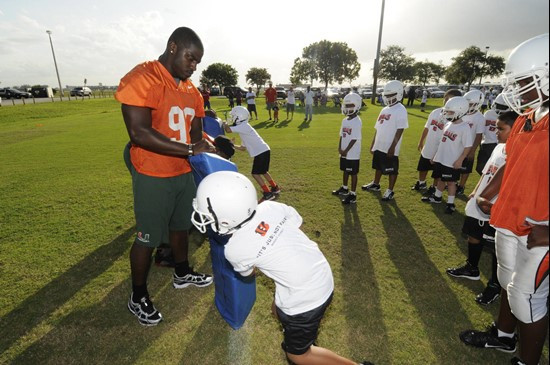 Steven Wesley running through drills with kids at PPO Field in Pembroke Pines.