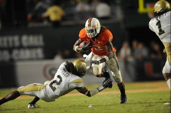 University of Miami Hurricanes running back Graig Cooper #2 carries the ball in a game against the Georgia Tech Yellow Jackets at Land Shark Stadium...