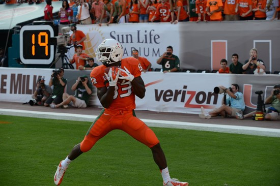 University of Miami Hurricanes wide receiver Kendall Thompkins #83 plays in a game against the University of South Florida Bulls at Sun Life Stadium...