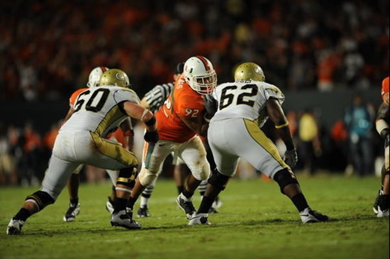 University of Miami Hurricanes defensive lineman Josh Holmes #92 plays in a game against the Georgia Tech Yellow Jackets at Land Shark Stadium on...