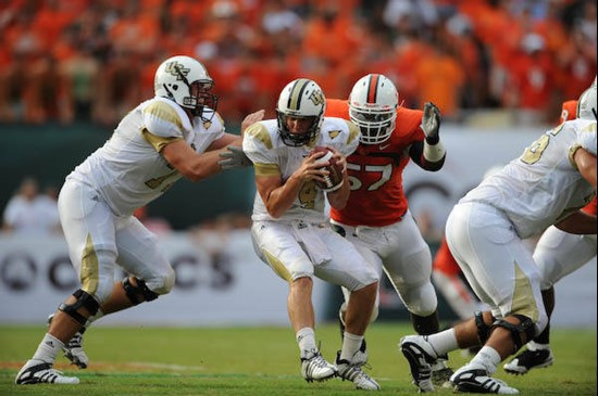University of Miami Hurricanes defensive lineman Allen Bailey #57 pressures the quarterback in a game against the University of Central Florida...