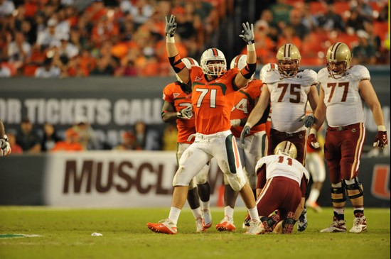 University of Miami Hurricanes defensive lineman Anthony Chickillo #71 makes a sack in a game against the Boston College Eagles at Sun Life Stadium on...