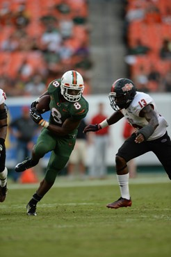 University of Miami Hurricanes running back Duke Johnson #8 catches a deflected pass in a game against the Arkansas State Red Wolves at Sun Life...