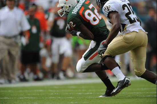 University of Miami Hurricanes wide receiver Kayne Farquharson #82 plays in a game against the Deamon Deacons of Wake Forest at Dolphin Stadium on...