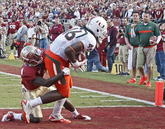 Florida State cornerback Mike Harris (1) can't stop Miami tight end Clive Walford (46) from scoring on a 2-yard touchdown pass during the second...