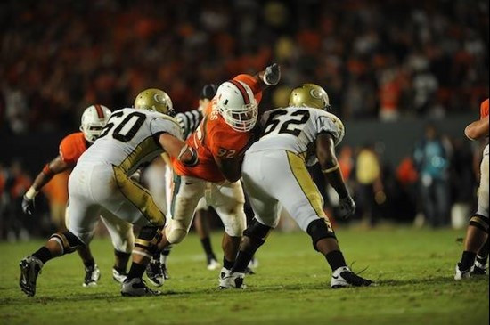 University of Miami Hurricanes defensive lineman Josh Holmes #92 plays in a game against the Georgia Tech Yellow Jackets at Land Shark Stadium on...