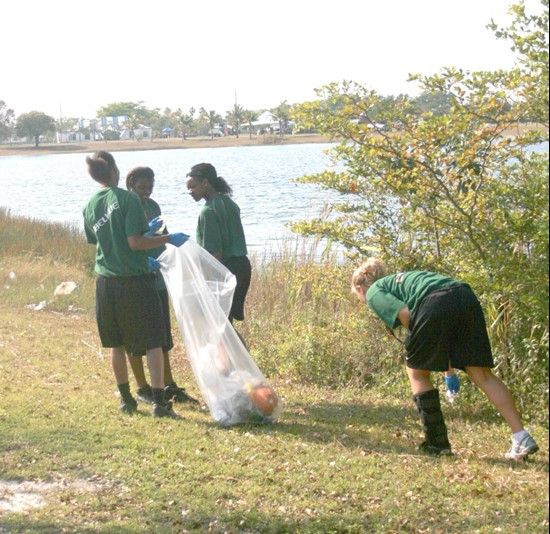 UM Staff, Coaches & Student Athletes volunteer at Amelia Earhart Park Community Service Project.