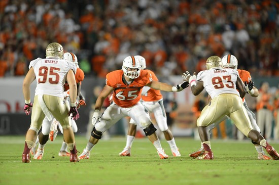 University of Miami Hurricanes offensive lineman Brandon Linder #65 and the Canes take on the Florida State Seminoles at Sun Life Stadium on October...