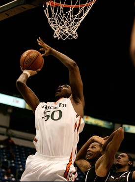 Anthony King goes up for a shot as VCU's Michael Anderson, center, and Lance Kearse look on. Miami won 69-63. (AP Photo/Andres Leighton)