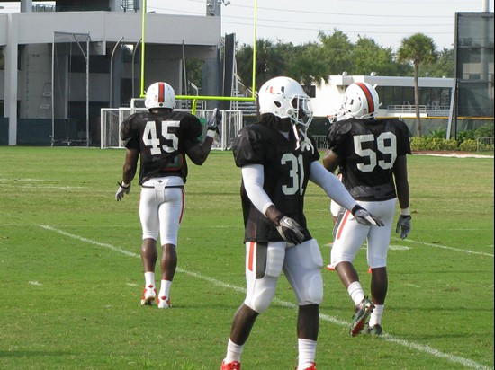 Linebackers Ramon Buchanan, Sean Spence and Jimmy Gaines get ready for a team drill on day seven of Fall training camp.