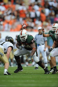 University of Miami Hurricanes offensive lineman Orlando Franklin #74 gets set to block against the Deamon Deacons of Wake Forest at Dolphin Stadium...