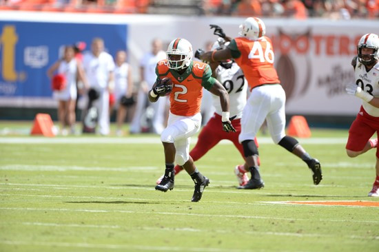 University of Miami Hurricanes running back Joseph Yearby #2 plays in a game against the Cincinnati Bearcats at Sun Life Stadium on October 11, 2014....