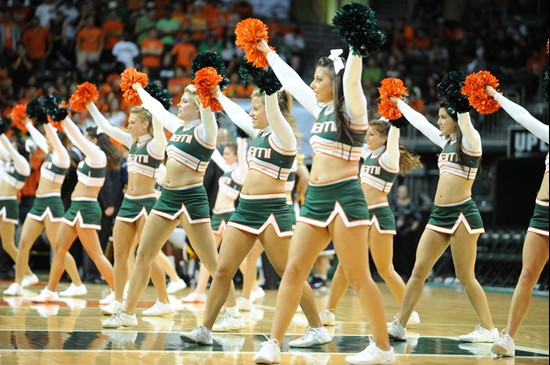 University of Miami Cheerleaders entertain fans as the Hurricanes play host to 2010 NCAA Final Four participant West Virginia at the BankUnited Center...